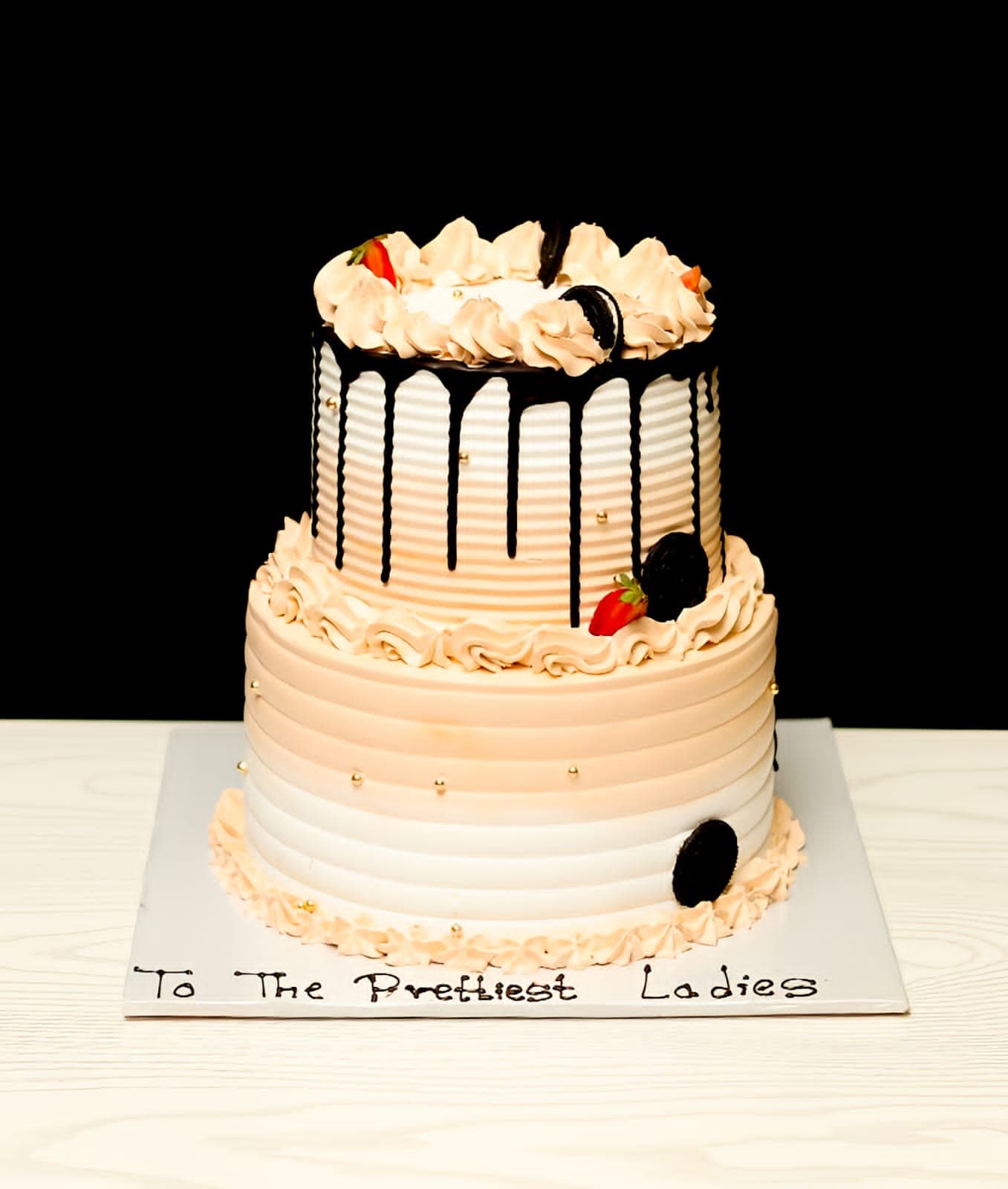Peach ombré two-tier cake from the bakery's feed